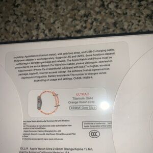 Apple Watch Ultra 2 with Orange Ocean Strap